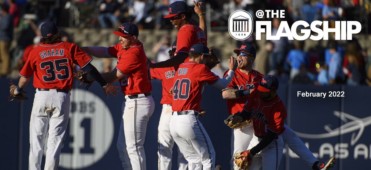 Baseball players excited on the field, UM Crest, @The Flagship, February 2022
